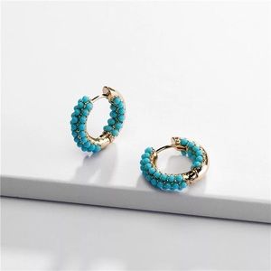 Golden hoops with blue enamel